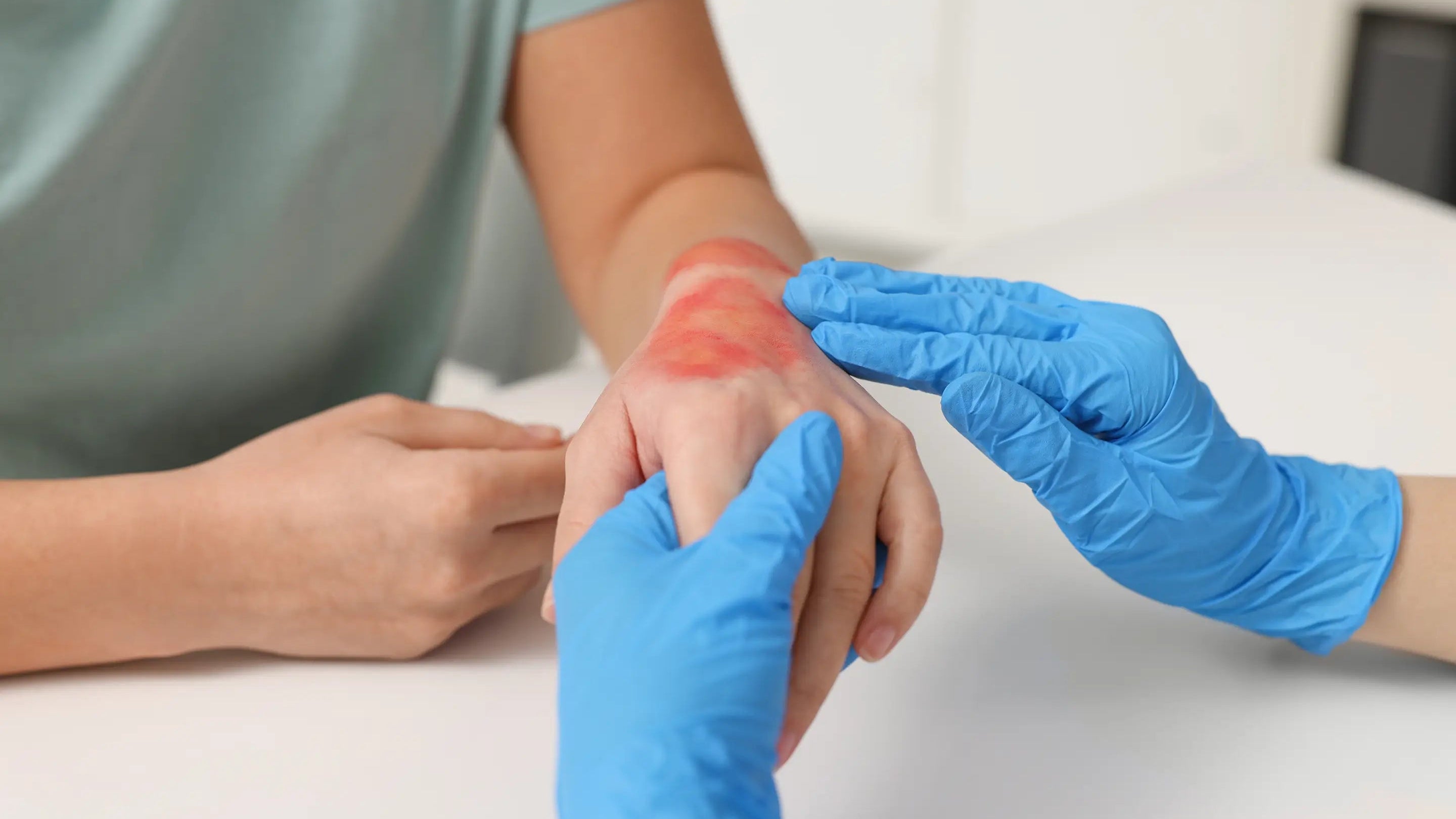 The nurse observed the patient's wound.